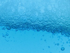 Blue liquid with many bubbles.