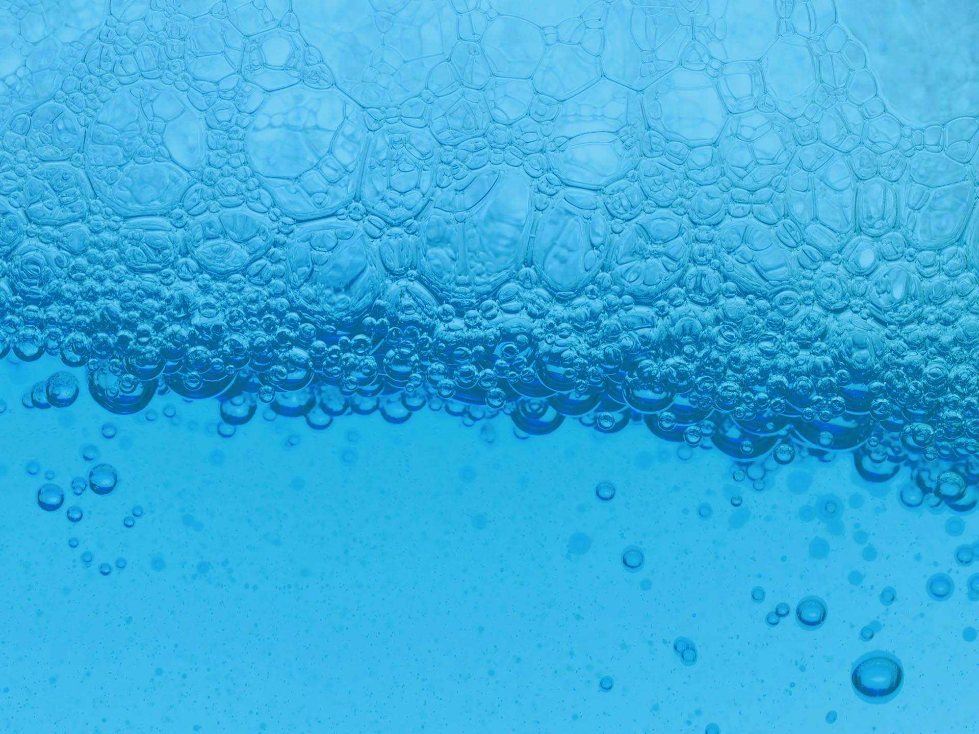 Blue liquid with many bubbles.