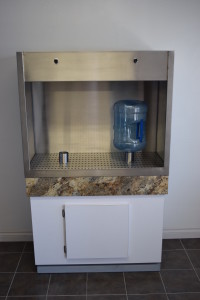 Water cooler with five-gallon bottle.