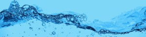 Blue water with bubbles splashing.