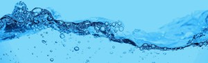 Blue water with bubbles flowing.
